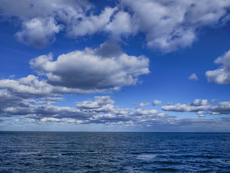 Clouds and Blue Sky above the Sea