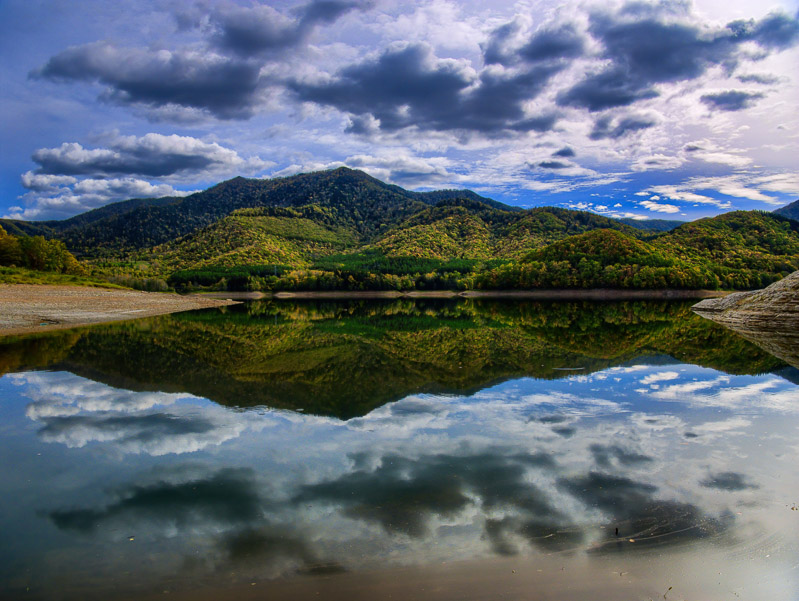 Mountain and Sky Clouds Mirror Image